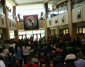 Distance Shot of Audience and Speaker