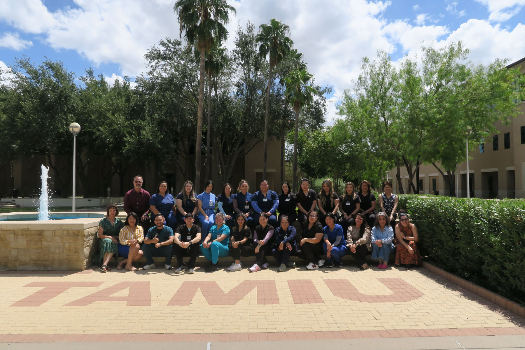 Nursing SANE participants posing infront of TAMIU Outdoor Fountain