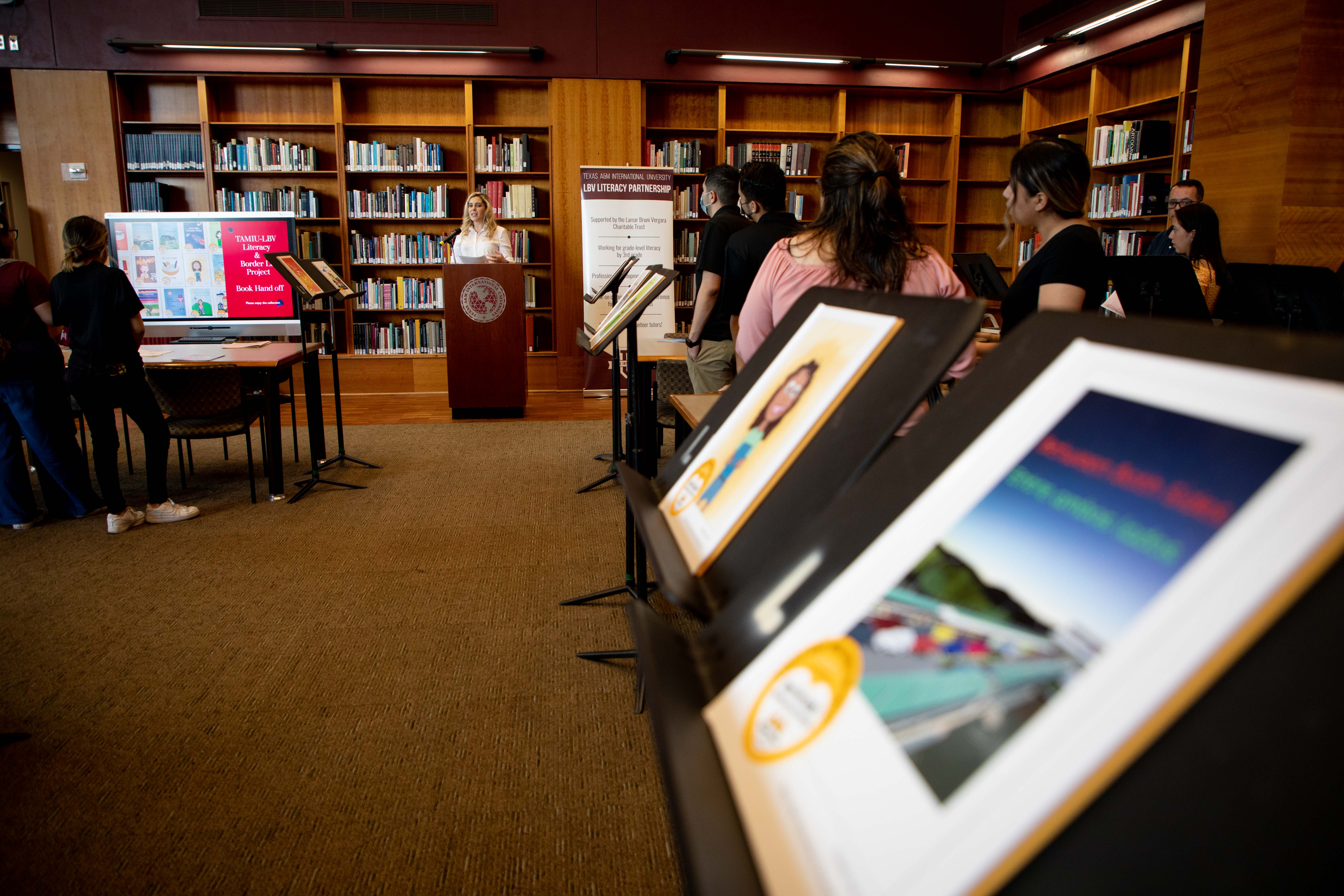 Dr. Kaitlyn Culliton addresses to the crowd during the book handoff
